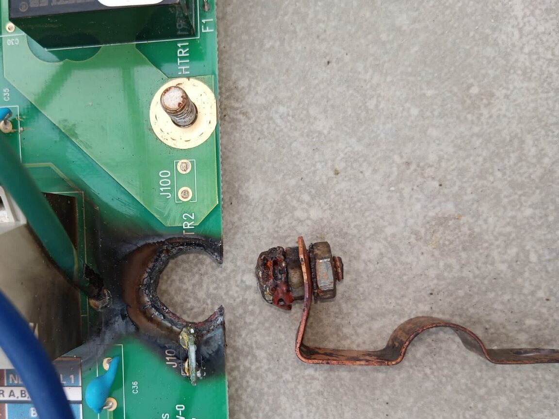 Hot-tub circuit board with severe heat damage around the heater terminal and burned copper heater strap