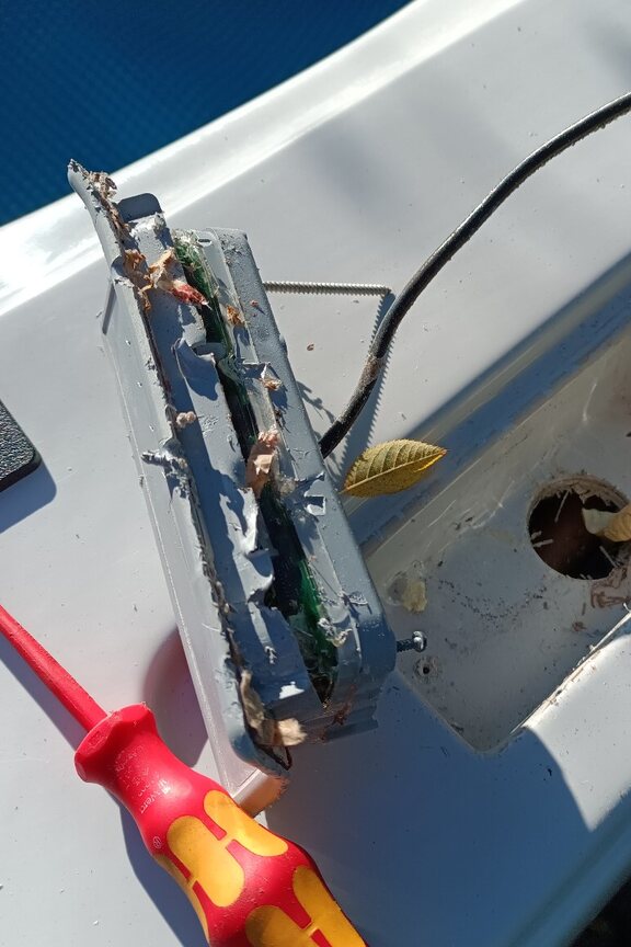 Removed damaged hot-tub topside control panel beside its mounting position